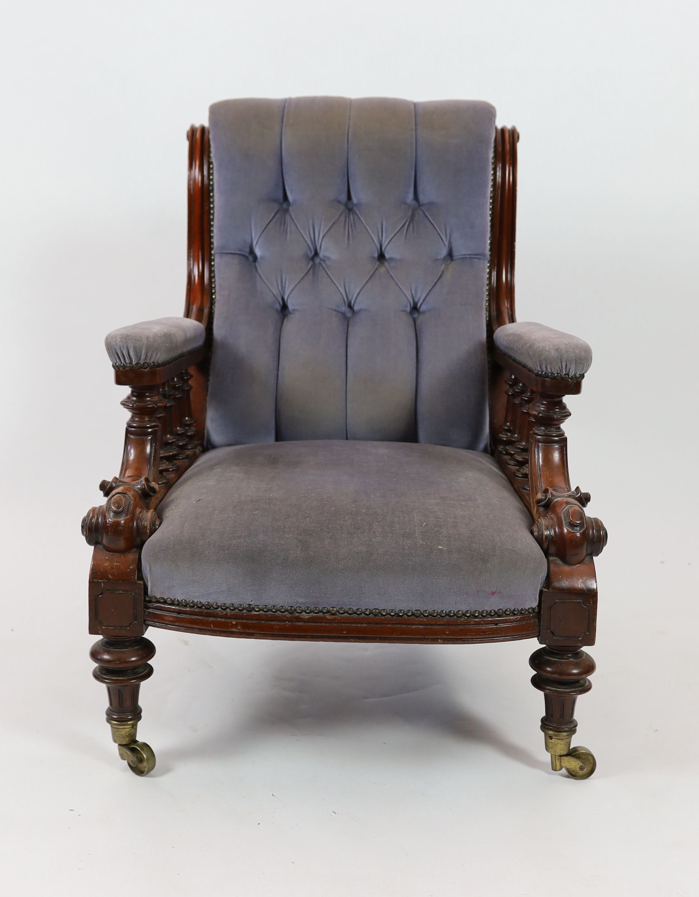 A Victorian mahogany upholstered armchair, width 66cm depth 74cm height 94cm